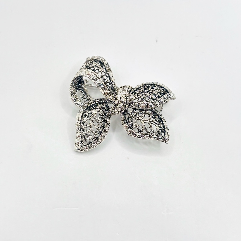 Elegant Silver Bow Brooch
